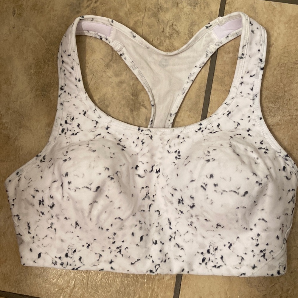 Marbled white sports bra with molded cups.